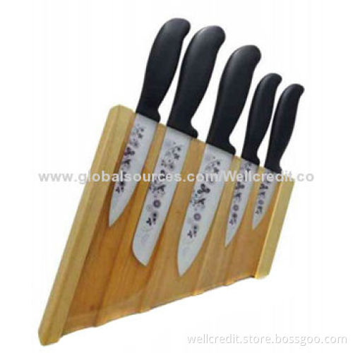 Good-quality ceramic knife set in wooden block